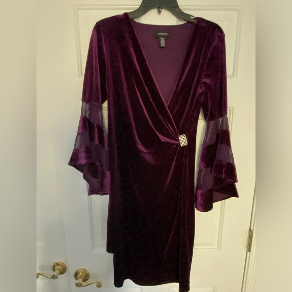 Stretch velour dress and a beautiful eggplant color. Size 6